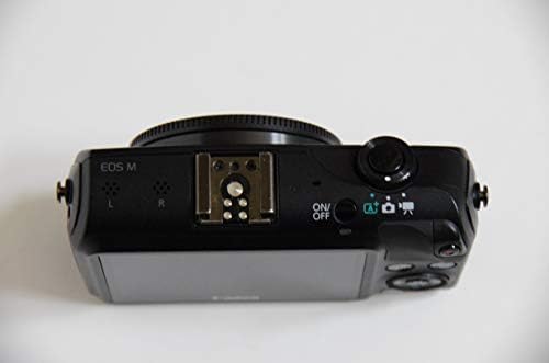 מצלמת מערכת קומפקטית של קנון אוס-גוף שחור בלבד