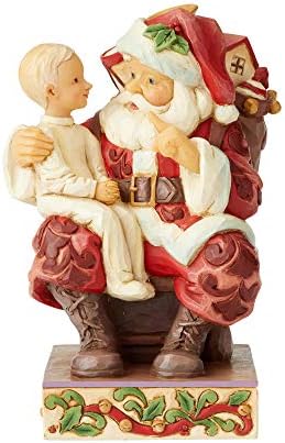 אנסקו סנטה עם ילד בפסלון הברכיים