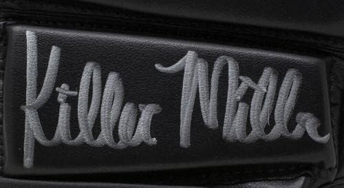 ג ' וליאנה קילר מילר חתמה על כפפות שחורות של יו - אף-סי